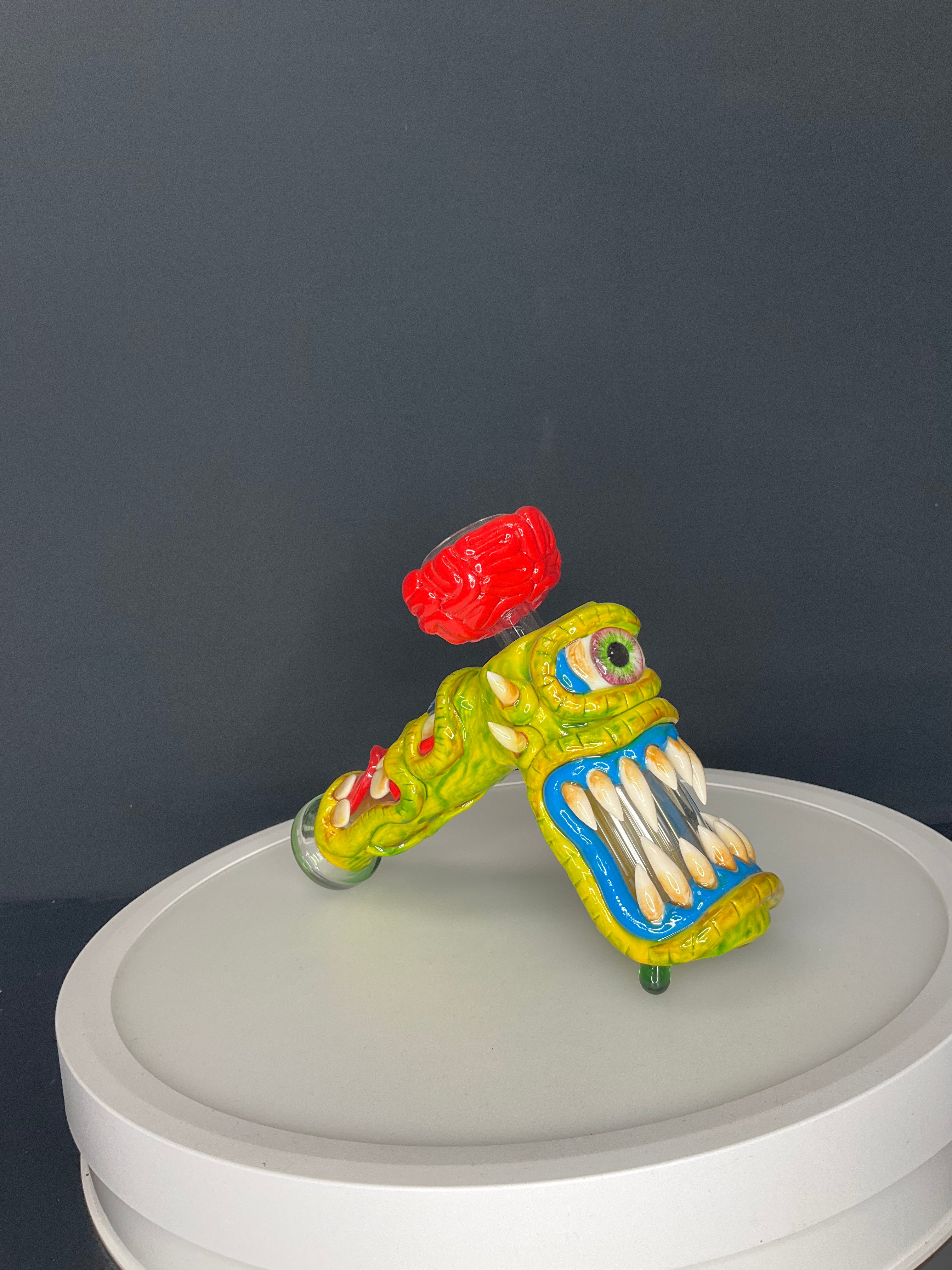 BUBBLER PIPE - ONE EYED MONSTER WITH TOUNGE OUT - RED
